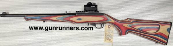 Sturm, Ruger, & Co. Inc., used, 10-22 Compact/Youth model, w/red, white, and blue laminated stock, with laser engraved American eagle on stock, suppressor ready 16.25” barrel, 1-10 round magazine, and a Bushnell red dot sight. - Image 4