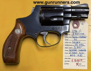 Smith & Wesson, Model 36 “Chief’s Special”, used, .38 Special caliber, 5-shot, 1.875” barrel, bobbed hammer, blued finish, double-action revolver, w/original grips and box.  Manufactured in 1982 and in superb condition.