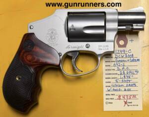 Smith & Wesson, Model 642-2, used, .38 Special +P caliber, 5-shot, double-action only revolver, 1.875” barrel, original box, and S&W custom grips.