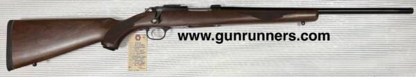 Ruger, Model 77/22, .22 Hornet caliber, right-hand bolt action, walnut/blue, 20” suppressor ready barrel, with 1 magazine.  Absolutely new in box!