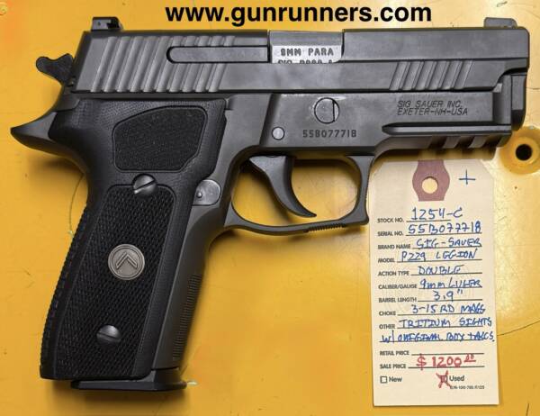 SIG-Sauer, used, P-229 Legion, double action semi-auto pistol, 9mm Luger caliber, tritium sights, 3-15 round magazines, w/original box and accessories.  In 99.99% condition!