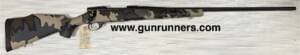 Weatherby, (used/unfired?), Vanguard, 6.5-.300 Weatherby Magnum caliber, right-hand bolt action, 26” fluted barrel, light weight rifle, w/camouflage stock, and original box.