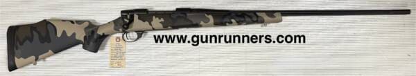 Weatherby, (used/unfired?), Vanguard, 6.5-.300 Weatherby Magnum caliber, right-hand bolt action, 26” fluted barrel, light weight rifle, w/camouflage stock, and original box.