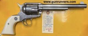 Ruger, used, Vaquero, .44-40 caliber, 7.5” barrel, single action revolver, stainless steel, with “Western” belt and holster, Ivorex grips, manufactured in 1994.