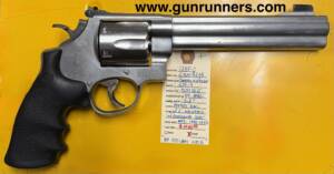 Smith and Wesson, used, Model 629-4, .44 Magnum caliber, double action revolver, 6.5” barrel with “Power Port” muzzle brake, 6 shot, no “Hillary hole”, firing pin on hammer, stainless steel, with original box and 2 holsters.  This is an uncommon, collectible, S&W revolver.