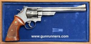 Smith & Wesson, used, Model 29-2, .44 Magnum, nickel finish, 6 shot, 8.375” barrel, target hammer, target trigger, red ramp front sight, white outline rear sight, manufactured 1977-1978, with wooden presentation case.