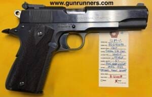 Custom Colt, used, 1911 Government Model Series 70, .45ACP caliber, single action semi auto pistol, blued finish, 5” barrel, front strap stippling, adjustable rear sight, custom grips, commander style hammer, manufactured in 1973, with 1 magazine.