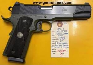 Wilson Combat, used, CQB, .45ACP caliber, 5” barrel, green/black Armor Tuff finish, 1911 single action semi auto pistol, 1-8 round magazine, 1.5” accuracy guarantee @ 25 yards from a rest, lifetime guarantee.   A superbly high quality pistol.