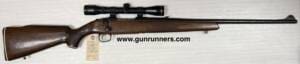 Mossberg, used, Model 800A, .308 caliber, right hand bolt action, wood/blue, iron sights, 22” barrel, with telescopic sight.