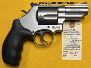 Smith & Wesson, new, Model 69, .44 Magnum caliber, 5 shot, stainless steel, double action revolver, adjustable sights, 2.75” barrel, absolutely new w/box and all accessories.